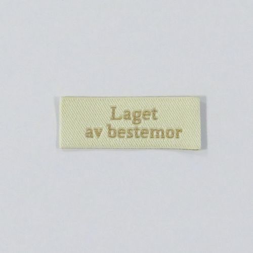 Vevd merkelapp Laget av bestemor